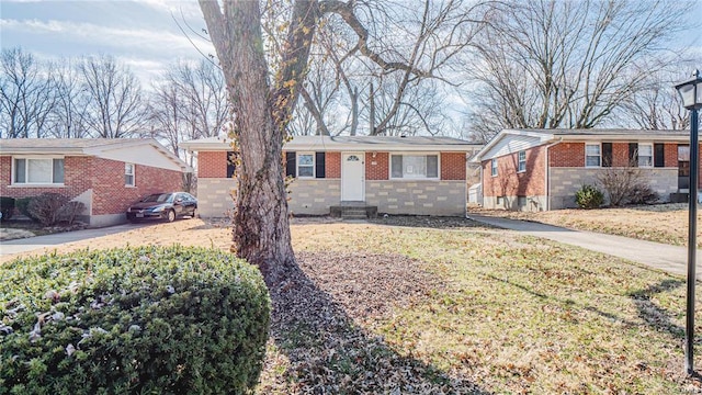 1370 Reale Ave, Saint Louis, MO 63138 - single story home with brick siding and entry steps