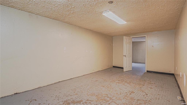 1370 Reale Ave, Saint Louis, MO 63138 - empty room featuring a textured ceiling