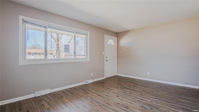 1370 Reale Ave, Saint Louis, MO 63138 - empty room featuring wood finished floors and baseboards