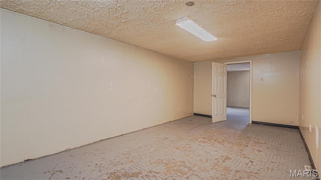 1370 Reale Ave, Saint Louis, MO 63138 - finished basement featuring a textured ceiling