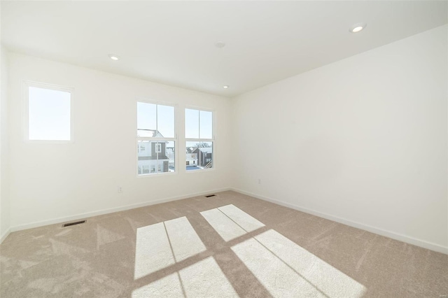 103 Cardow Dr Unit 169-605, Ofallon, MO 63368 - unfurnished room featuring carpet, baseboards, and recessed lighting