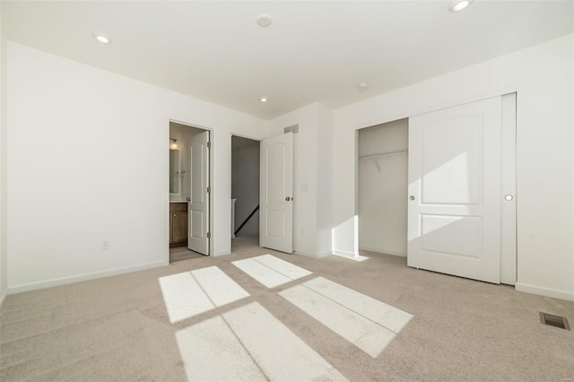103 Cardow Dr Unit 169-605, Ofallon, MO 63368 - unfurnished bedroom with light carpet, baseboards, and recessed lighting