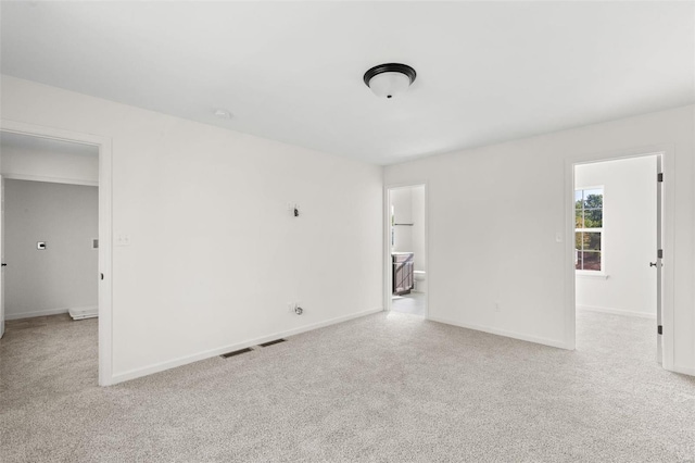 212 Westhaven Circle Dr, Wentzville, MO 63385 - carpeted spare room with baseboards