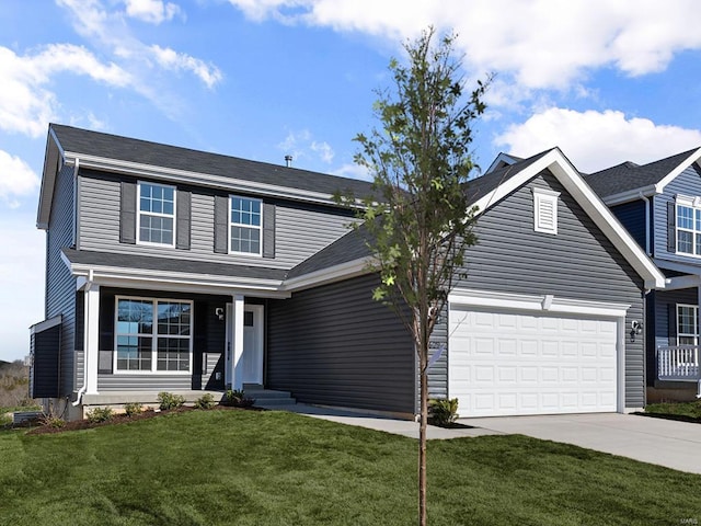 3 Harrow Ct, Ofallon, MO 63385 - traditional-style home with concrete driveway, a front lawn, and an attached garage