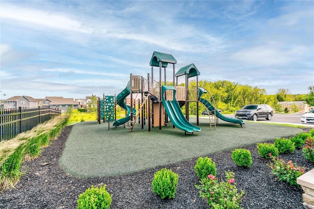 community jungle gym with fence