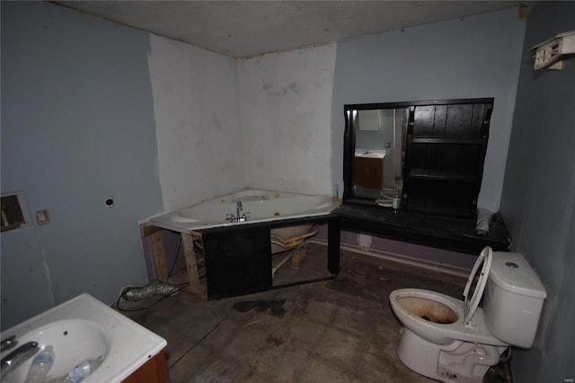306 S Mine La Motte St, Fredericktown, MO 63645 - full bathroom with vanity, toilet, a tub with jets, and unfinished concrete floors