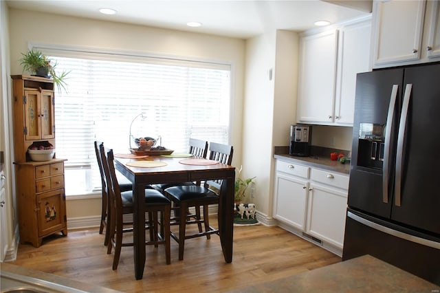 10 Anemone Rd, Lake Ozark, MO 65049 - dining area with light wood-style floors, baseboards, and recessed lighting