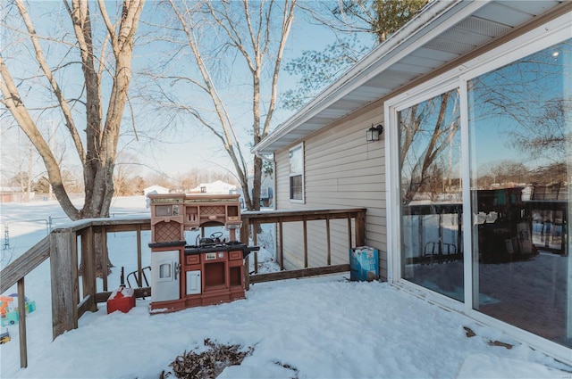 view of snow covered deck
