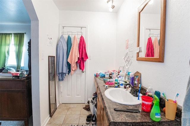 bathroom featuring vanity and tile patterned flooring