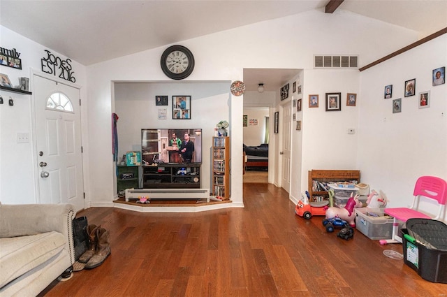 foyer featuring wood finished floors and baseboards