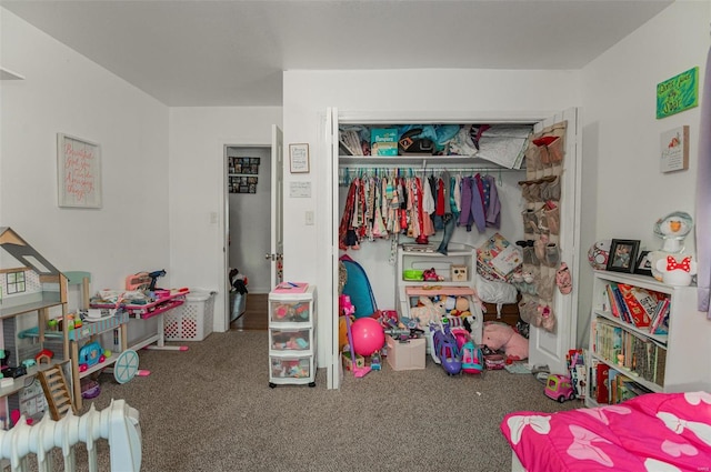 bedroom with carpet floors and a closet