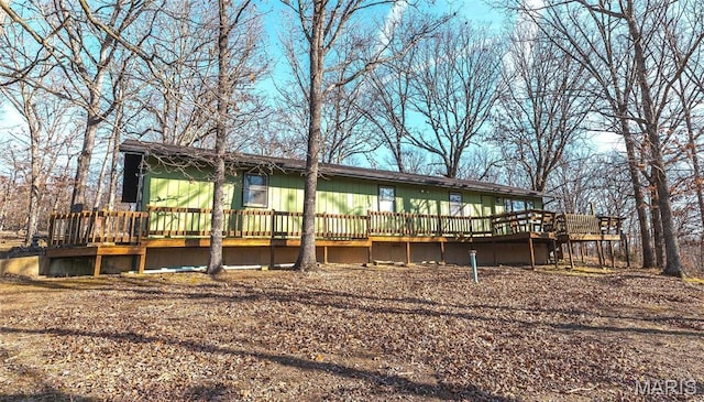 12135 Greenwood Rd, Cabool, MO 65689 - rear view of property with a deck