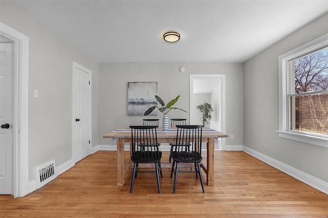 1100 Northdale Ave, Saint Louis, MO 63138 - dining room featuring light wood-type flooring and baseboards