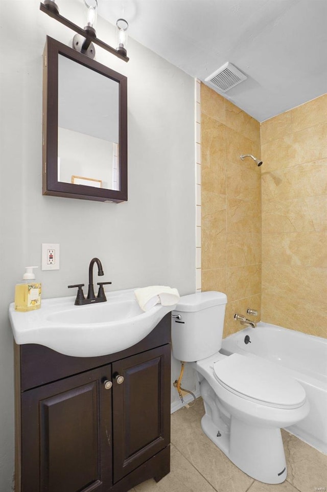 1100 Northdale Ave, Saint Louis, MO 63138 - full bath featuring toilet, tile patterned floors, vanity, and bathtub / shower combination