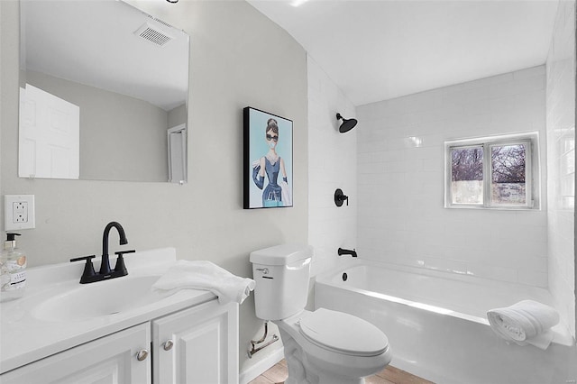 1100 Northdale Ave, Saint Louis, MO 63138 - full bath with toilet, shower / bath combination, vanity, and wood finished floors
