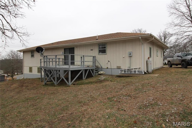 2013 Catalina Dr, West Plains, MO 65775 - back of property with a wooden deck