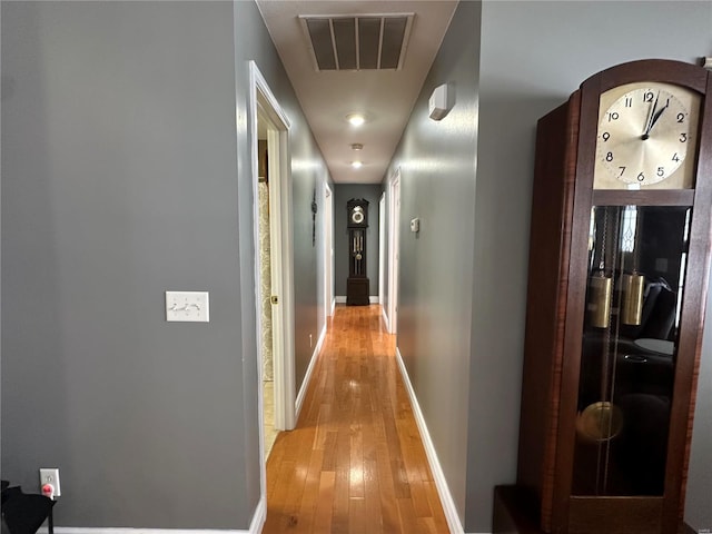 121 Stull Dr, Benton, MO 63736 - hallway with light wood-style flooring and baseboards