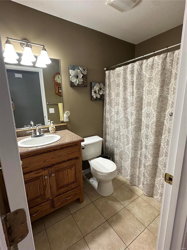 121 Stull Dr, Benton, MO 63736 - full bathroom featuring tile patterned floors, vanity, toilet, and a shower with shower curtain