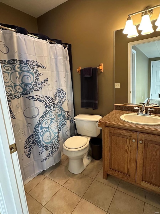 121 Stull Dr, Benton, MO 63736 - bathroom with tile patterned floors, vanity, toilet, and a shower with shower curtain