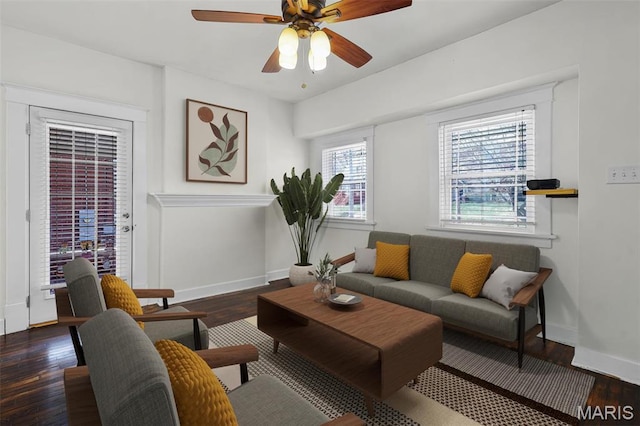2326 Bellevue Ave, Saint Louis, MO 63143 - living room with baseboards, a ceiling fan, and wood finished floors