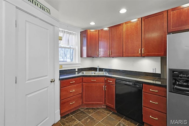 2326 Bellevue Ave, Saint Louis, MO 63143 - kitchen with stainless steel fridge, black dishwasher, a sink, recessed lighting, and dark stone finish flooring