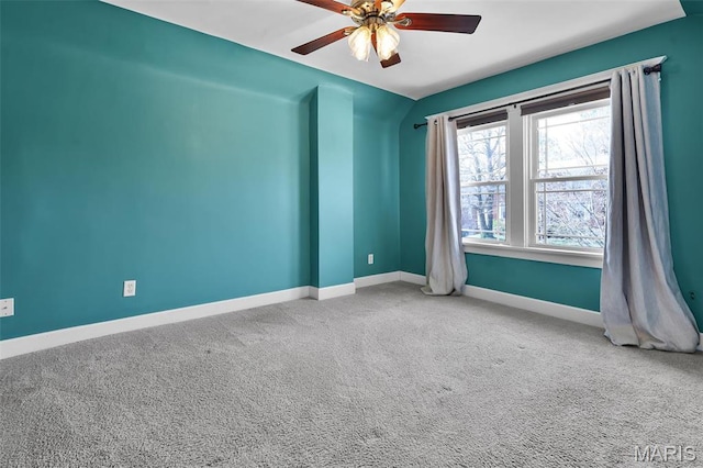 2326 Bellevue Ave, Saint Louis, MO 63143 - carpeted spare room featuring baseboards and ceiling fan