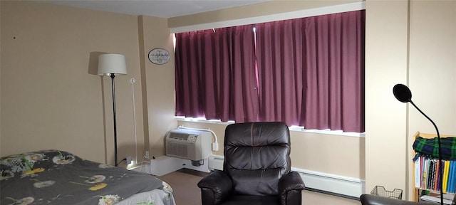 carpeted bedroom featuring a baseboard radiator