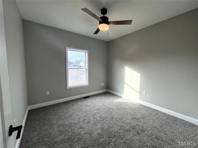 210 Sunny Dr, Rolla, MO 65401 - carpeted spare room featuring baseboards and ceiling fan