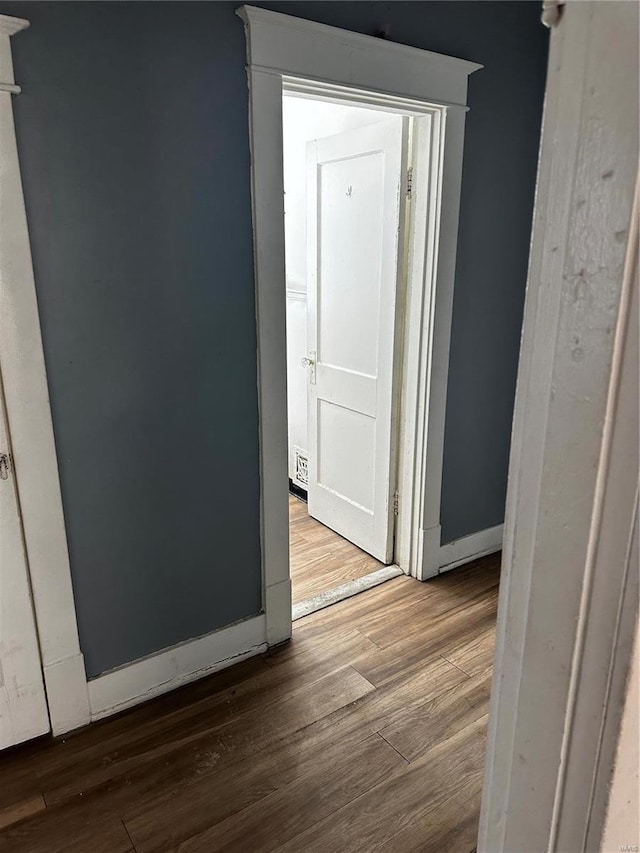 6705 Saint Louis Ave, Saint Louis, MO 63121 - hall featuring wood finished floors and baseboards