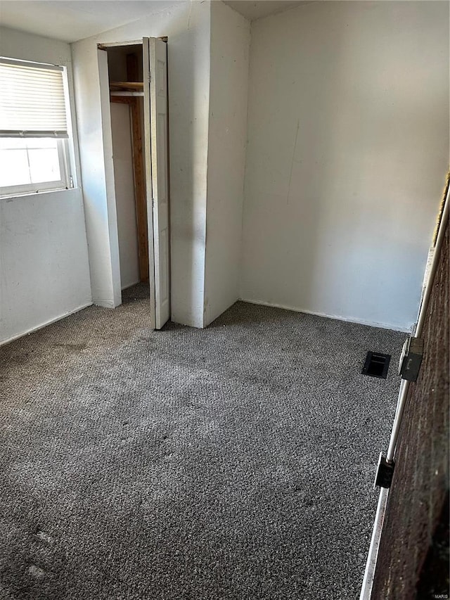 6705 Saint Louis Ave, Saint Louis, MO 63121 - unfurnished bedroom with carpet and a closet