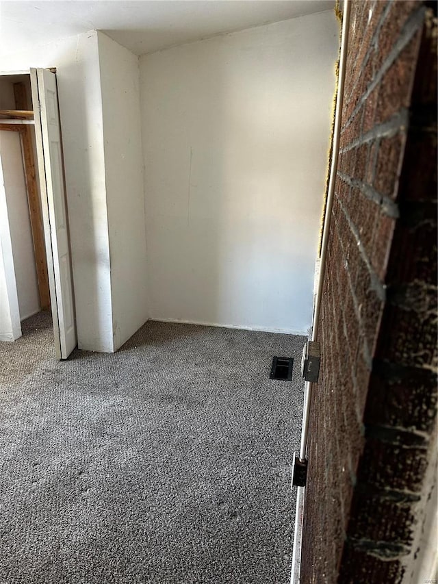 6705 Saint Louis Ave, Saint Louis, MO 63121 - unfurnished bedroom featuring carpet