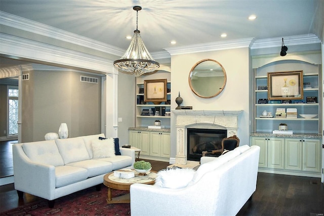 267 Saint Andrews Dr, Saint Albans, MO 63073 - living room with dark wood finished floors, a premium fireplace, a chandelier, crown molding, and recessed lighting