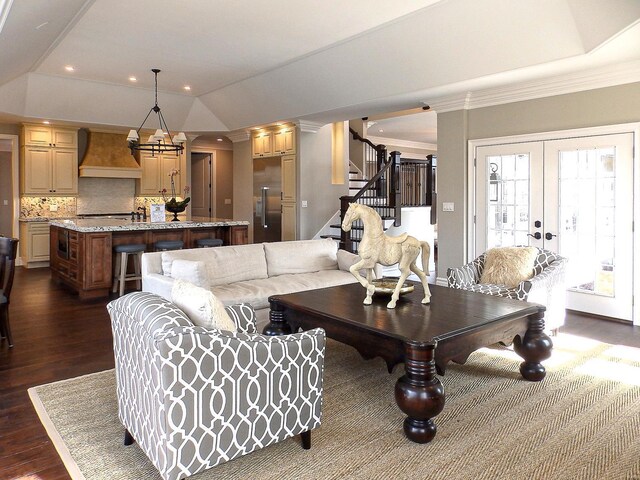 267 Saint Andrews Dr, Saint Albans, MO 63073 - living room featuring crown molding, dark wood finished floors, stairway, recessed lighting, and french doors