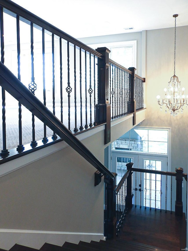267 Saint Andrews Dr, Saint Albans, MO 63073 - staircase featuring a chandelier