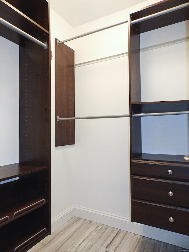 267 Saint Andrews Dr, Saint Albans, MO 63073 - walk in closet with light wood-style floors