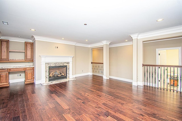 267 Saint Andrews Dr, Saint Albans, MO 63073 - unfurnished living room featuring dark wood-style floors, crown molding, a fireplace, recessed lighting, and baseboards