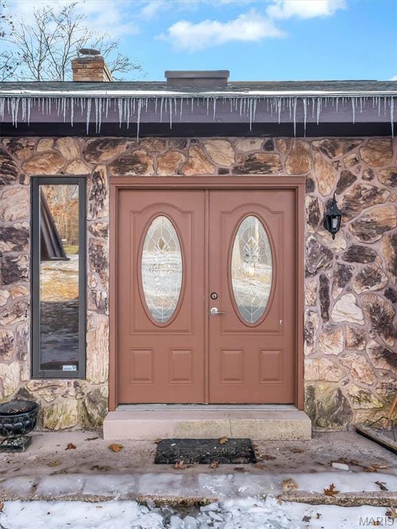 3553 Evergreen Dr, Catawissa, MO 63015 - view of exterior entry featuring a chimney