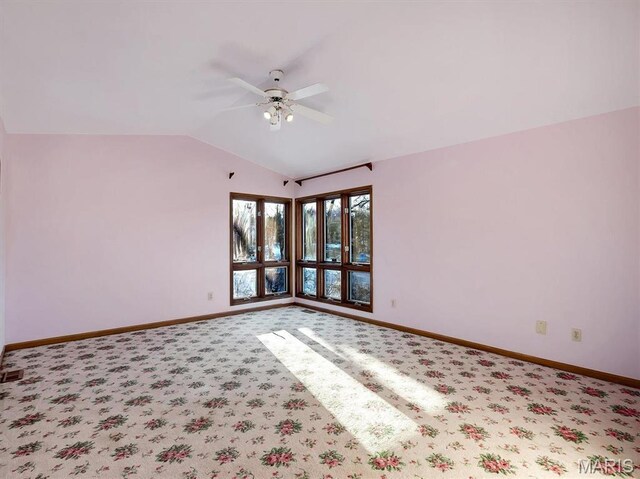 3553 Evergreen Dr, Catawissa, MO 63015 - carpeted empty room with a ceiling fan, vaulted ceiling, and baseboards