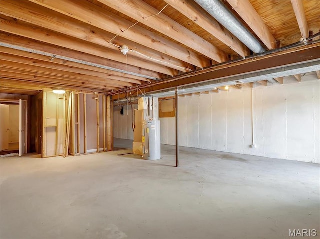 3553 Evergreen Dr, Catawissa, MO 63015 - unfinished basement featuring water heater