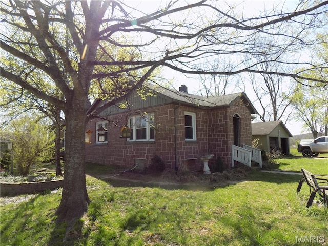 170 County Rd, Ironton, MO 63650 - view of home's exterior with a chimney and a yard