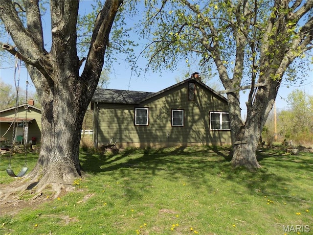 170 County Rd, Ironton, MO 63650 - view of home's exterior with a lawn and a chimney