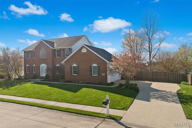 view of front of house featuring concrete driveway, brick siding, and an attached garage