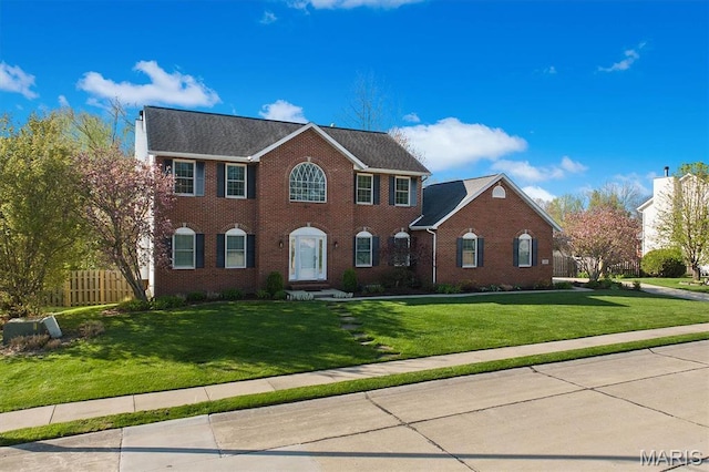 colonial house with brick siding