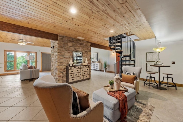 tiled living room with stairs, wooden ceiling, baseboards, lofted ceiling, and ceiling fan