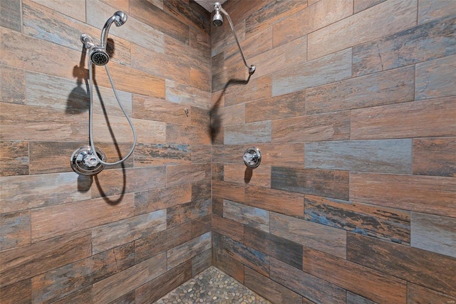 bathroom view of tiled shower