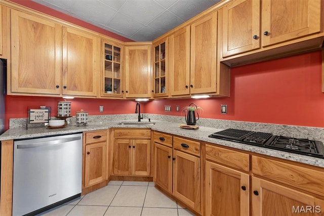 17102 Deer Mountain Rd, Marthasville, MO 63357 - kitchen featuring stainless steel dishwasher, black gas stovetop, light tile patterned flooring, a sink, and glass insert cabinets