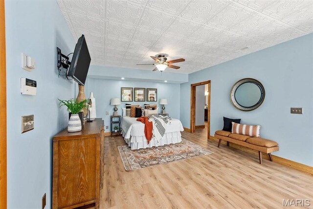 17102 Deer Mountain Rd, Marthasville, MO 63357 - bedroom with wood finished floors, baseboards, ceiling fan, and an ornate ceiling