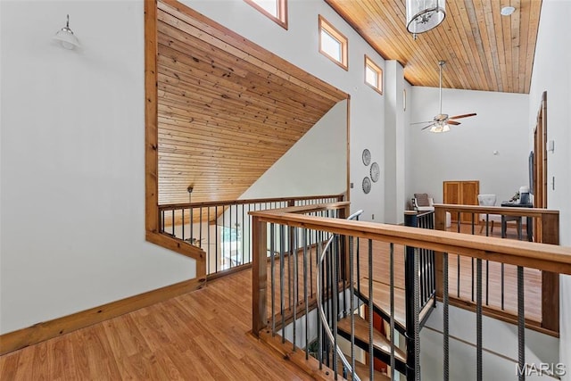 17102 Deer Mountain Rd, Marthasville, MO 63357 - hall with wooden ceiling, wood finished floors, an upstairs landing, high vaulted ceiling, and baseboards