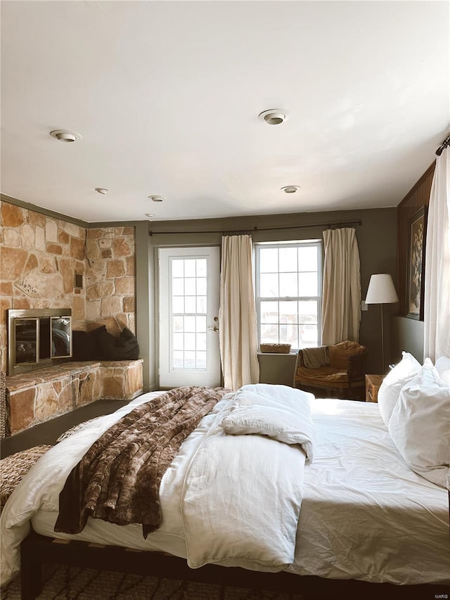 bedroom featuring multiple windows