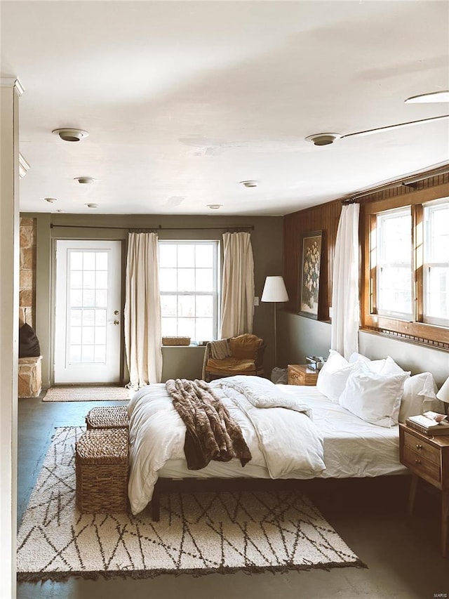 bedroom with multiple windows
